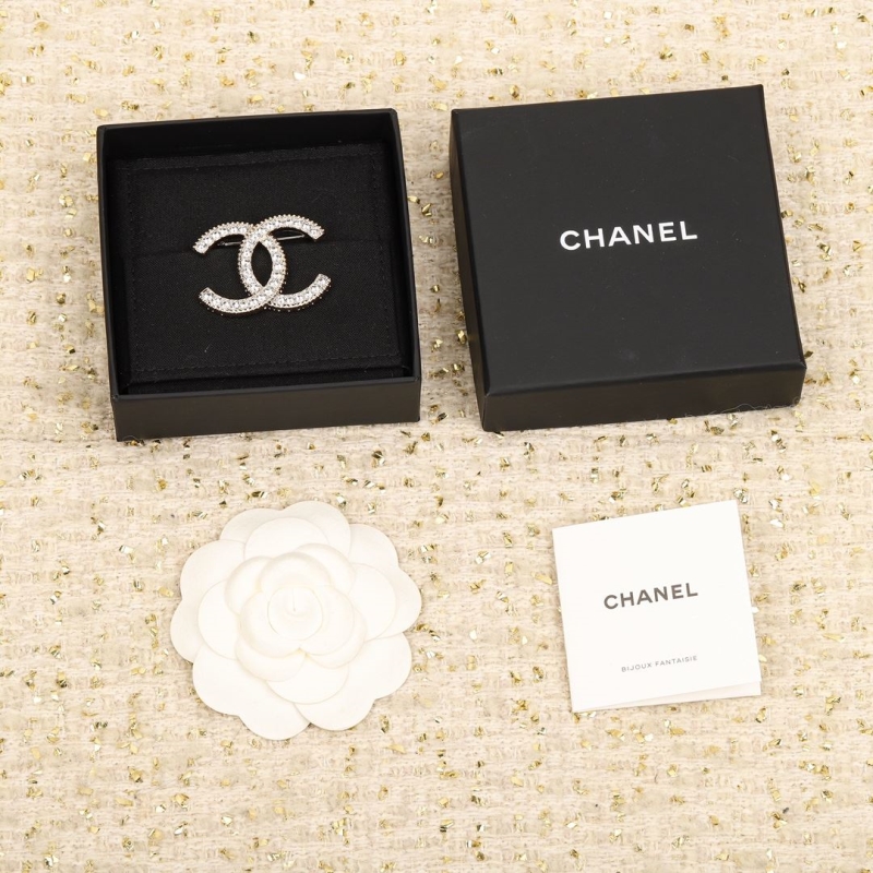 Ch**el brooches